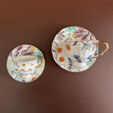 luxury bone china teacup and saucer set floral pattern with full gold handle elegant red & blue options for afternoon  coffee