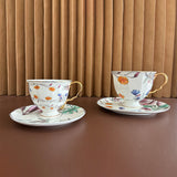 luxury bone china teacup and saucer set floral pattern with full gold handle elegant red & blue options for afternoon  coffee